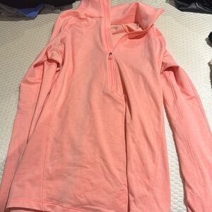 Women’s coral dry fit half zip.